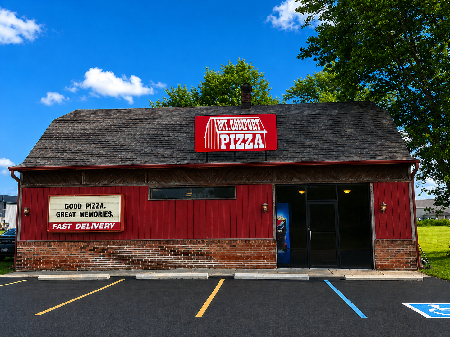 The red barn-style Mt. Comfort Pizza building at 5875 W US 40, Greenfield IN